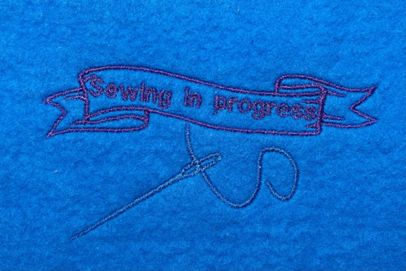 Sewing in Progress: A Quirky Embroidery Design for Creative Sellers